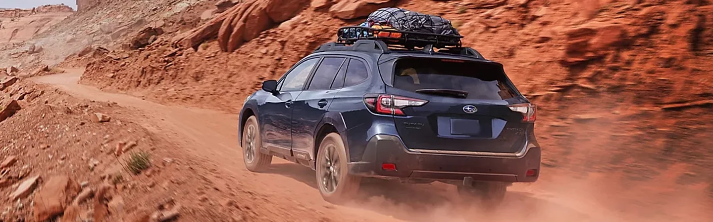2024 Subaru Outback vs 2024 Ford Bronco blue color and back view