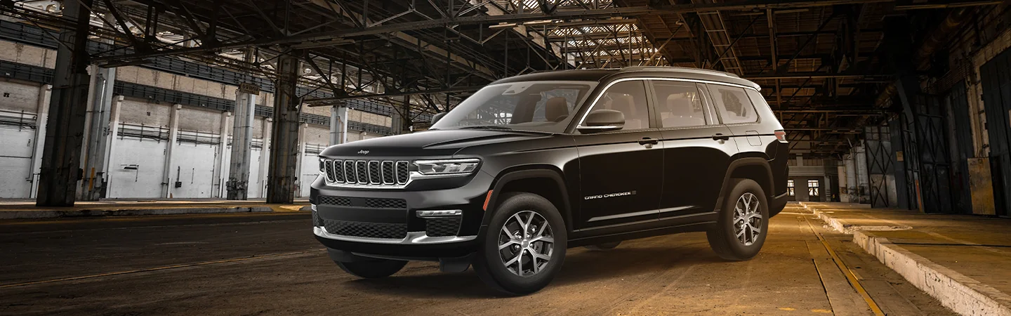 2025 Jeep Grand Cherokee Red color car front view on road