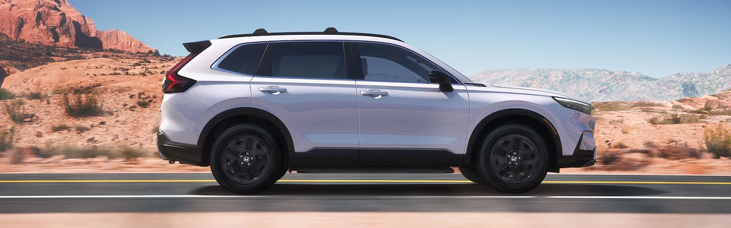 2025 Ford Escape vs 2025 Honda CR-V side front in white
