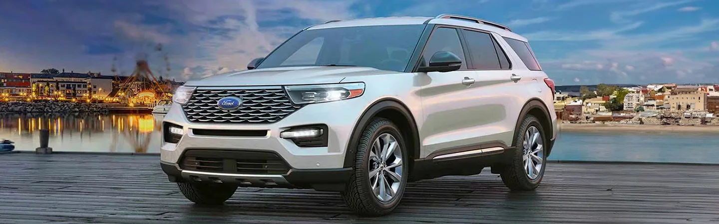 2025 Ford Explorer vs 2024 Chevrolet Traverse front side in silver