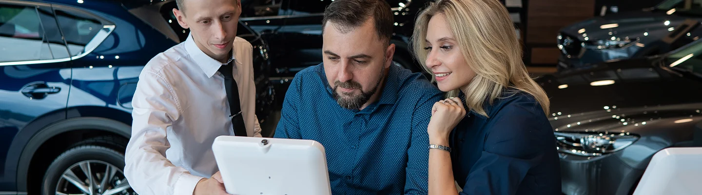 Finance manager helping customers go over their options