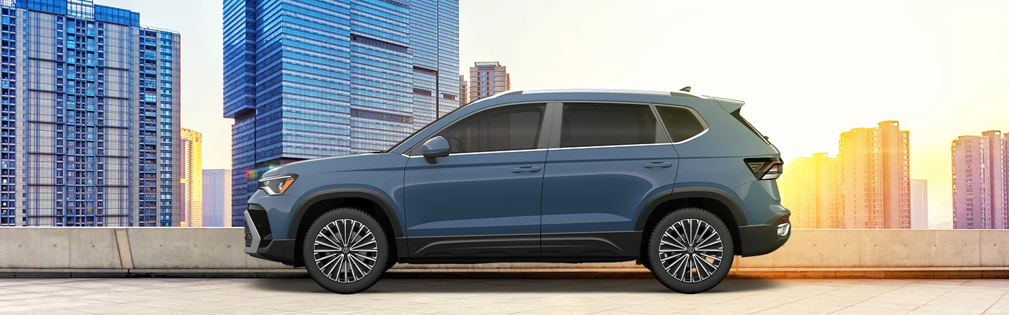 2025 Volkswagen Taos parked in a city