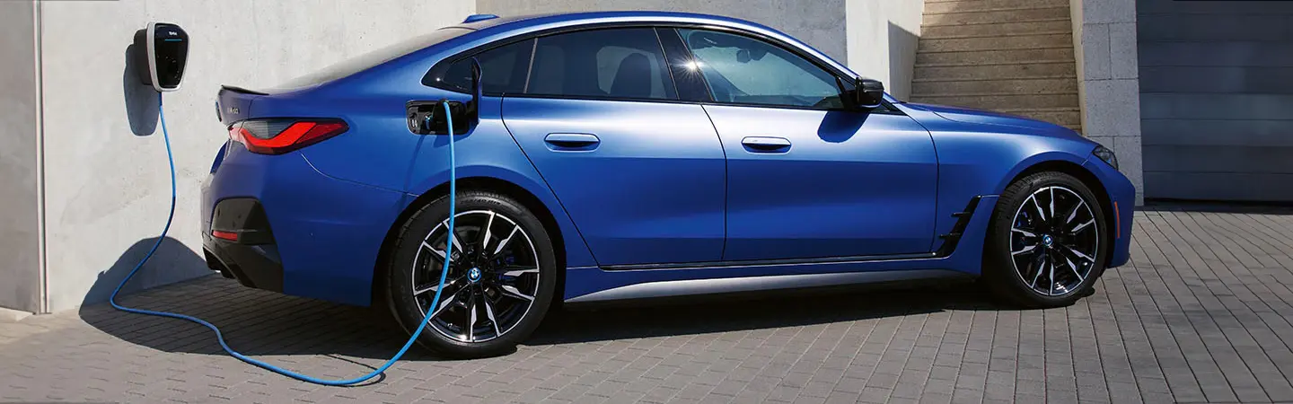 2024 BMW i4 Specs side back in white