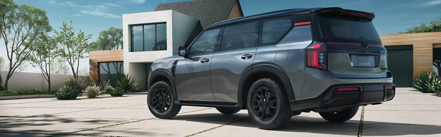 2025 Nissan Armada parked in front of a residence