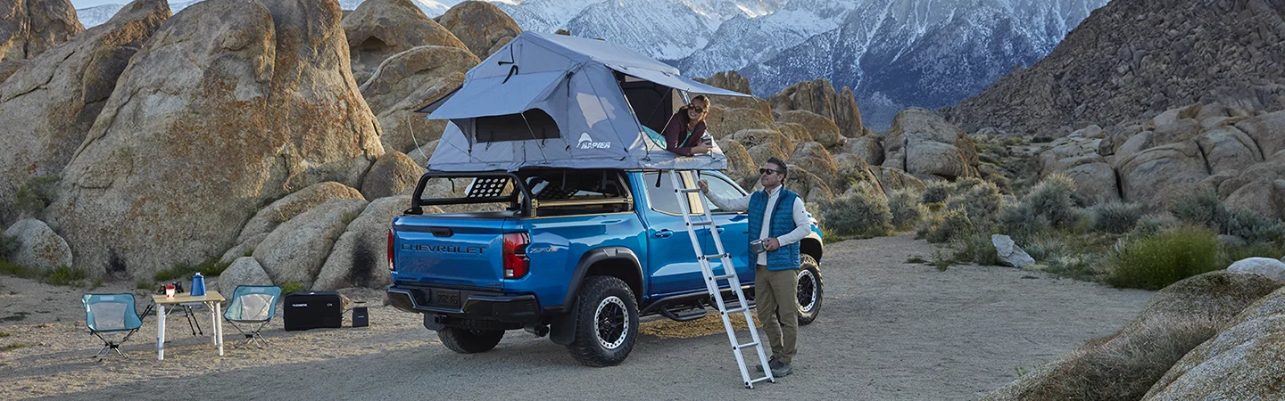 blue Chevy Colorado camping