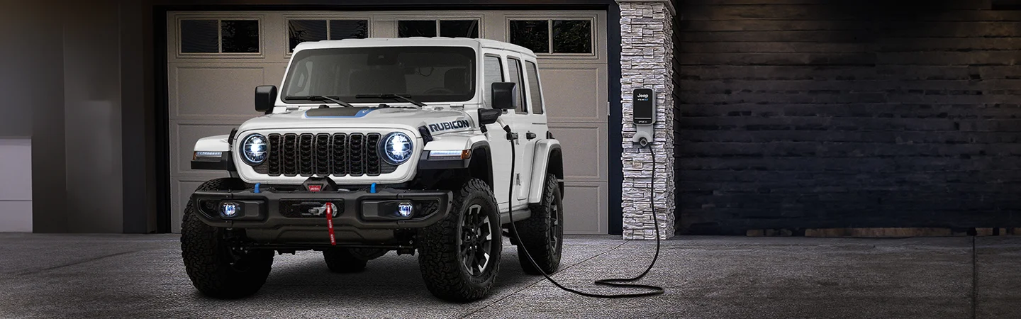 white Jeep charging