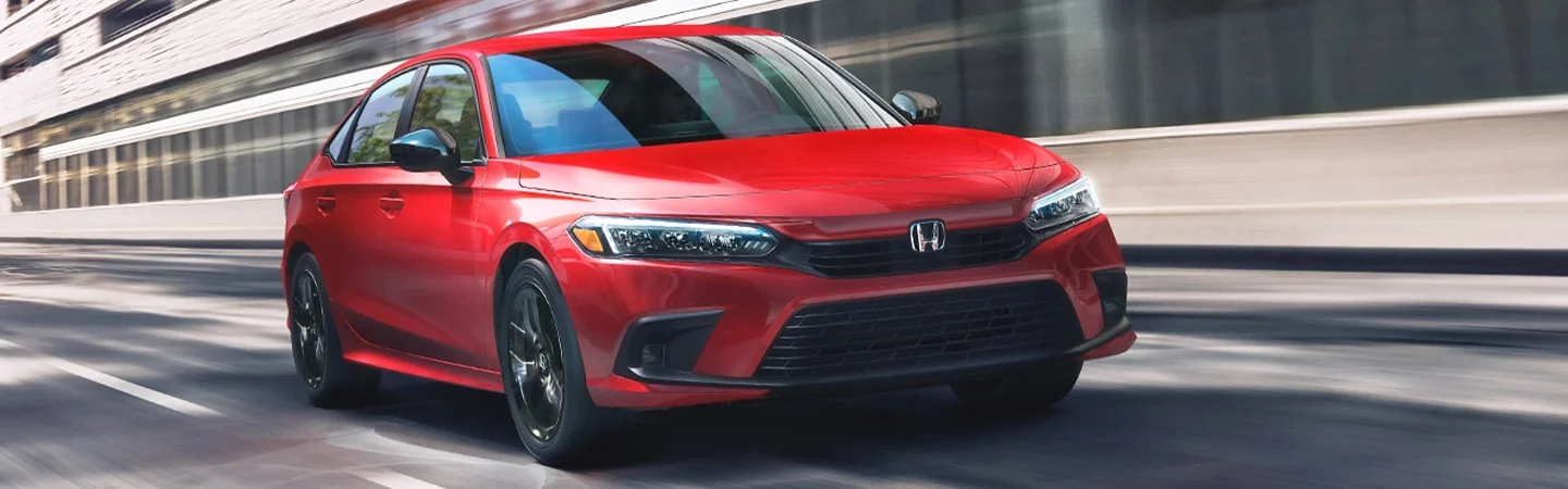 2024 Honda Civic vs Toyota Corolla front side in red