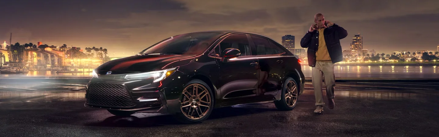 2024 Honda Civic vs Toyota Corolla front side in black
