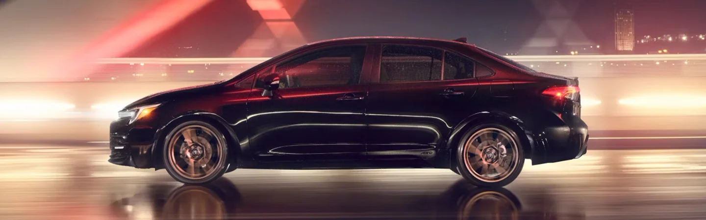 2024 Honda Civic vs Toyota Corolla side front in black