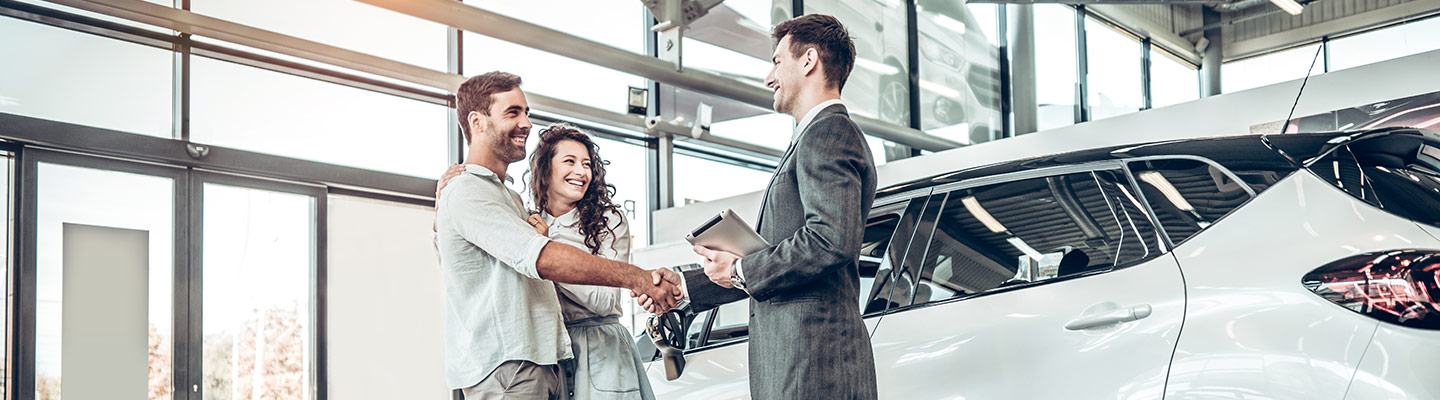 shaking hands in showroom