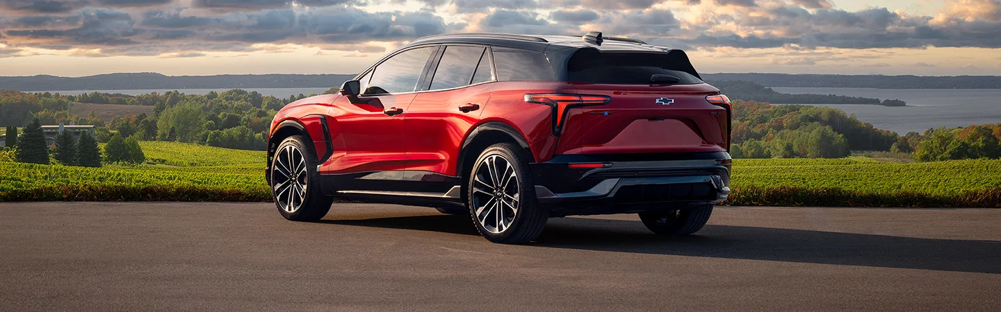 2025 Chevrolet Blazer vs. Honda CR-V red color  stand on road