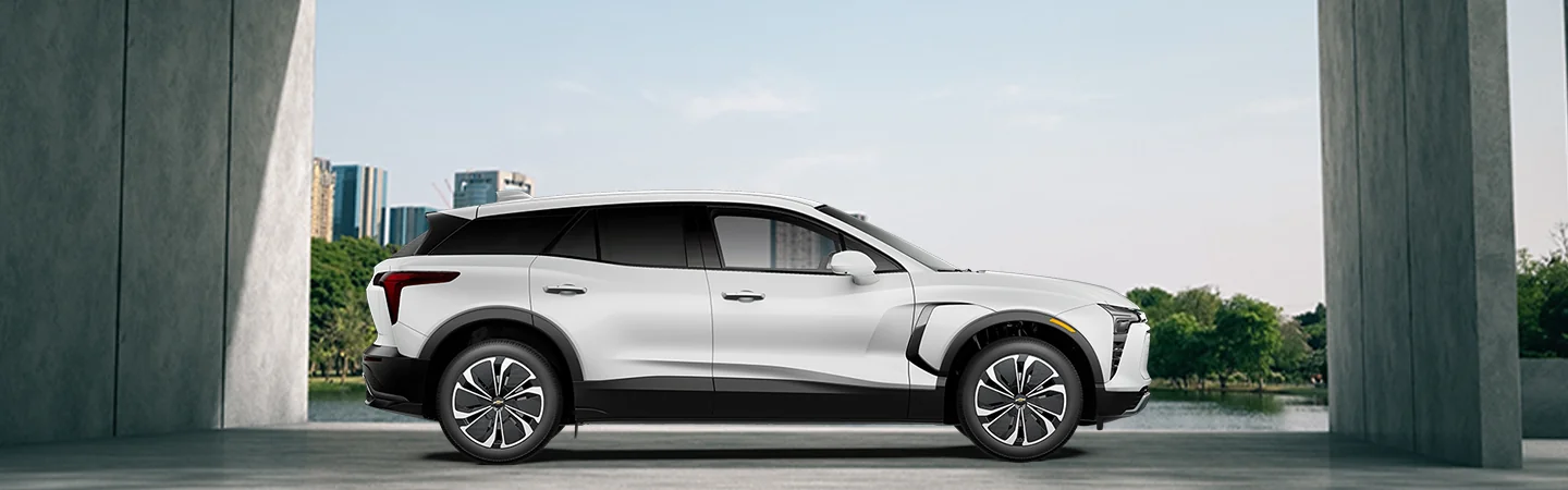 2025 Chevrolet Blazer vs. Honda CR-V white color stand city on road