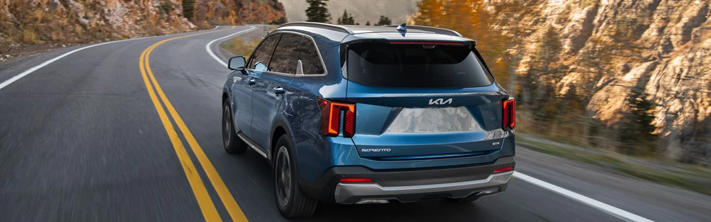 rear view of a 2025 Kia Sorento Hybrid in motion