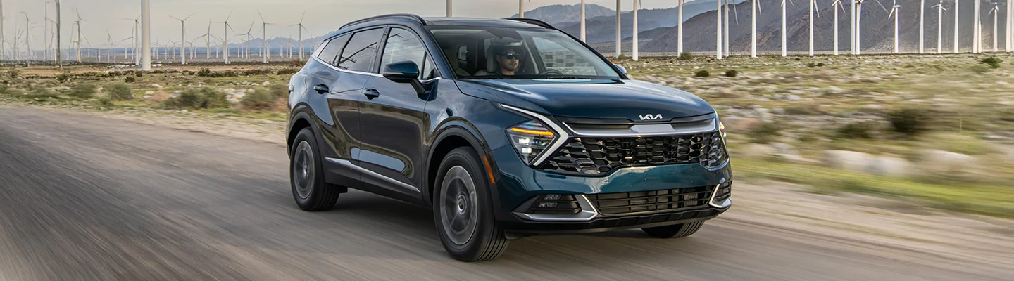 view from the front of a dark blue Kia model