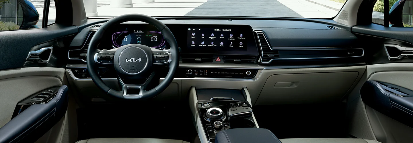 Interior view of the dash area of 2025 Kia Sportage Hybrid