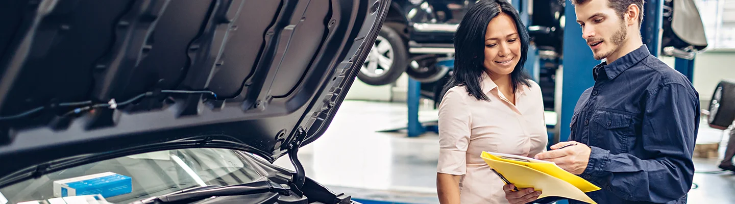 repair tech going over the bill with customer