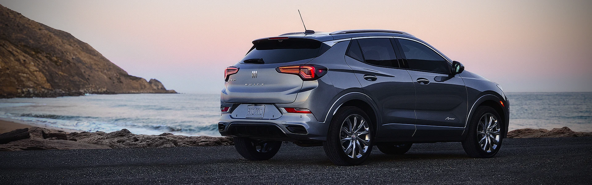 rear of Buick GX on beach
