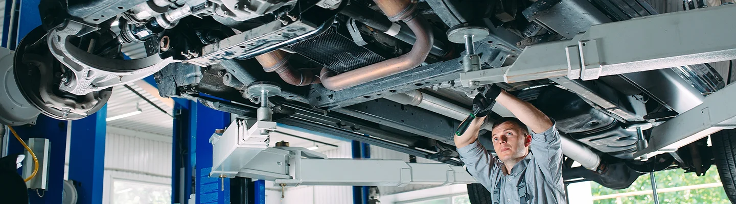 tech working under car