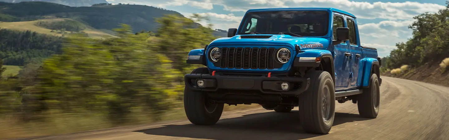 2024 Jeep Gladiator vs Ford Ranger blackcolor forntview