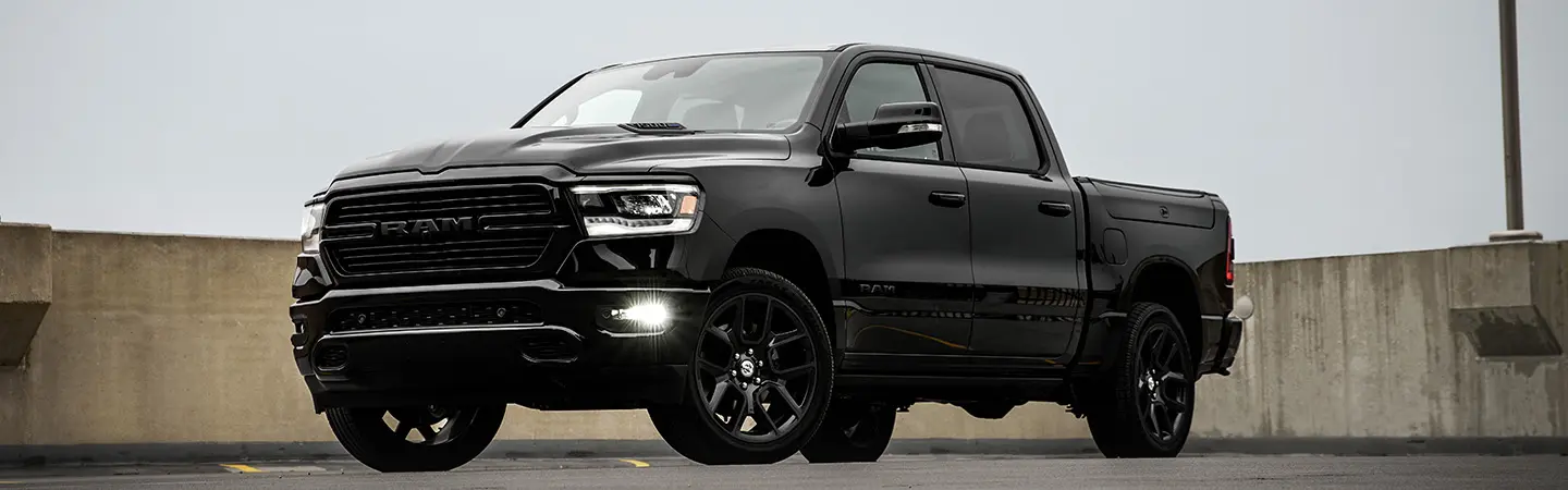2024 RAM 1500 vs Ford F 150  black side 
