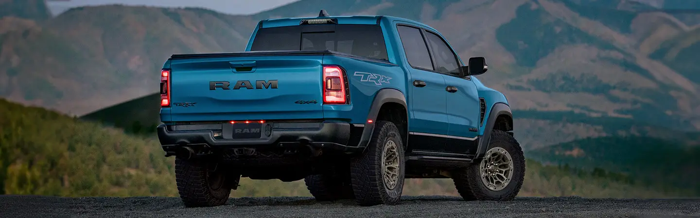 2024 RAM 1500 vs Ford F 150 black side 