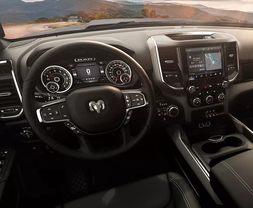 Interior view of the dashboard and tech of a 2026 RAM 1500 in Lithia Springs, GA
