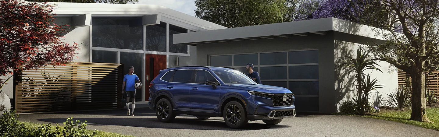 parked at home 2025 Honda CR-V Hybrid Sport
