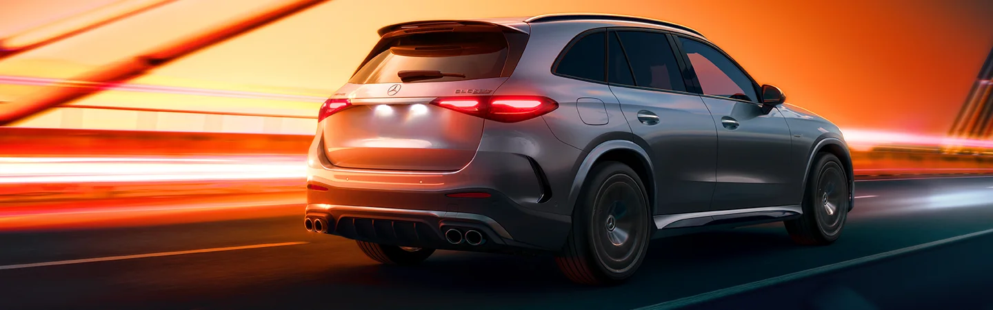 side parked silver Mercedes-benz GLC