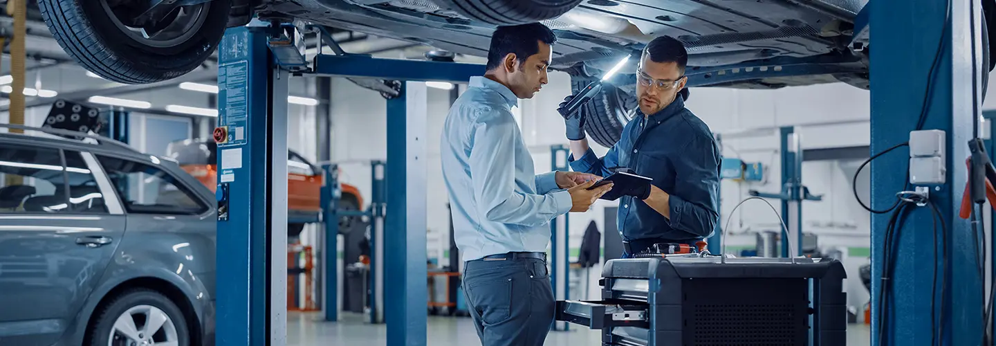 techs working in repair bay
