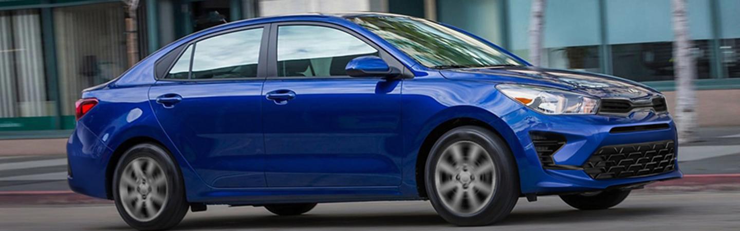 2021 Kia Rio driving in the city