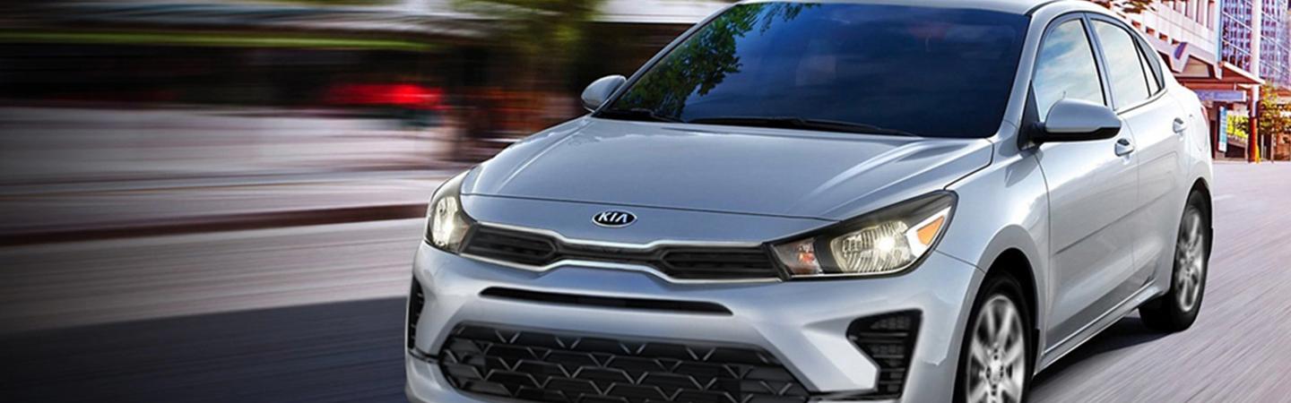 2021 Kia Rio driving in the city
