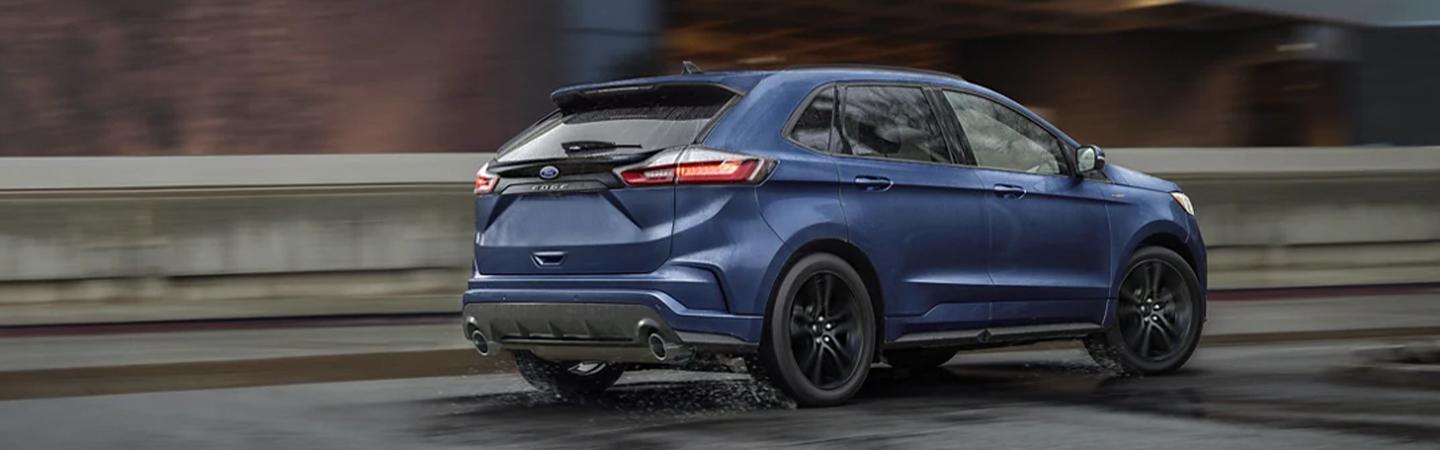 Back view of a 2022 Ford Edge driving