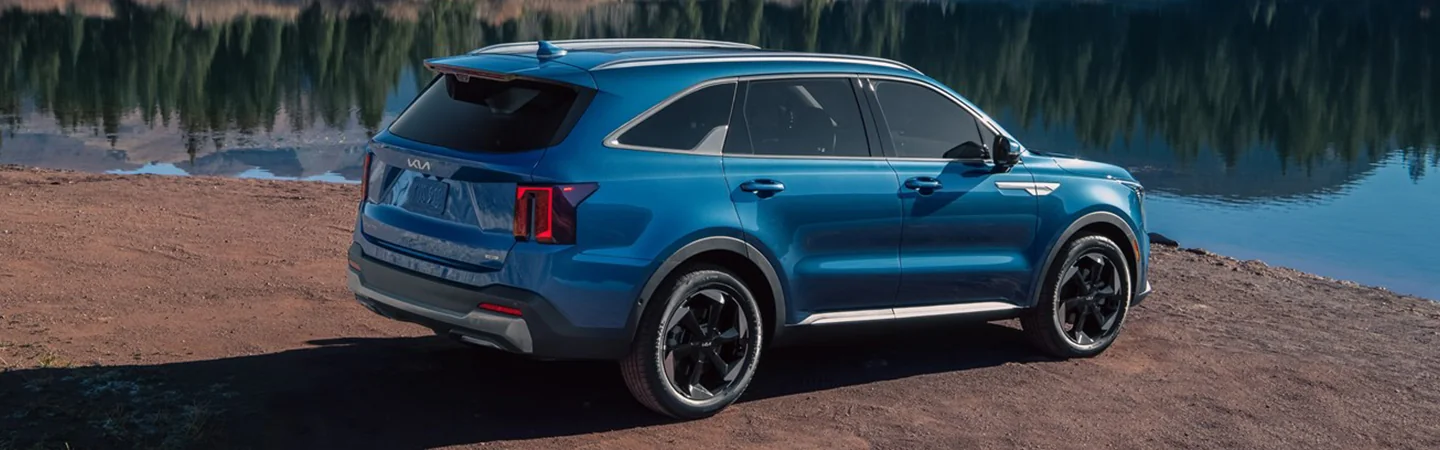 Blue 2025 Kia Sorento Hybrid parked by alake