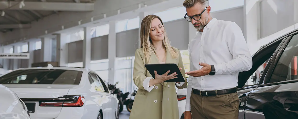 people car shopping in showroom