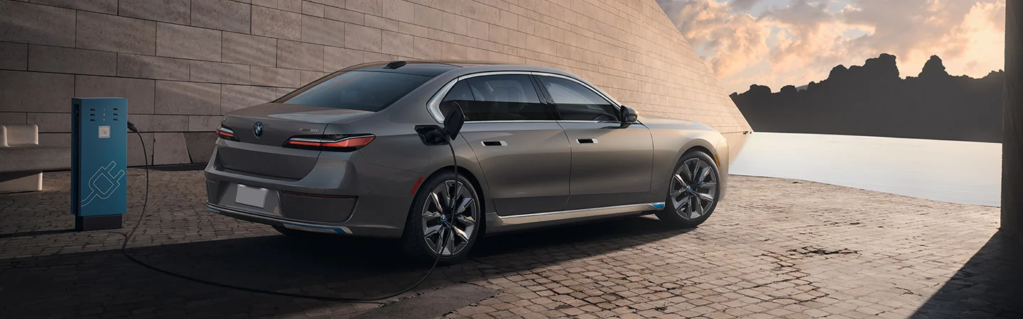 2025 BMW i7 eDrive50 parked by a charger
