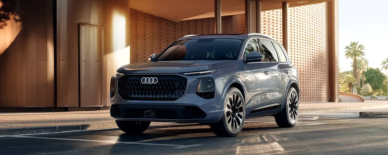 Audi Vehicle parked outside of a luxury building
