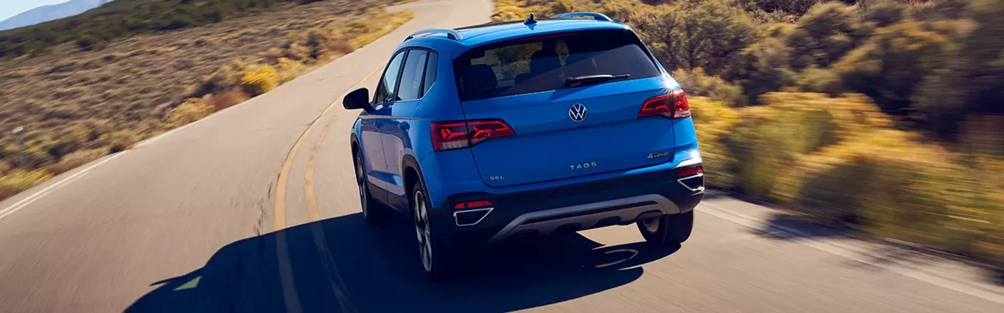 2024 Volkswagen Taos vs Kia Seltos bluecolor backview