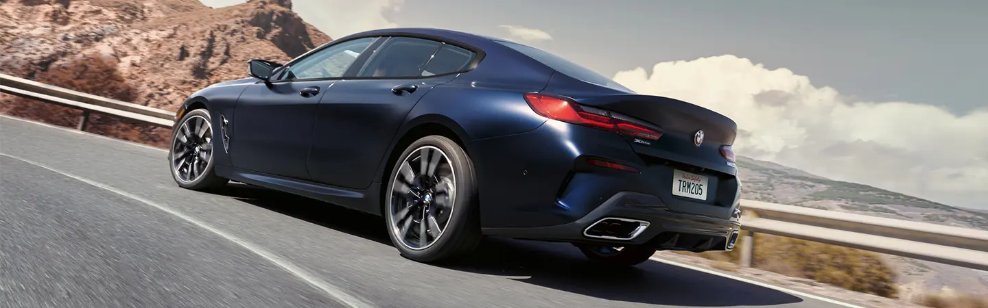 2024 BMW 8 Series side front in blue