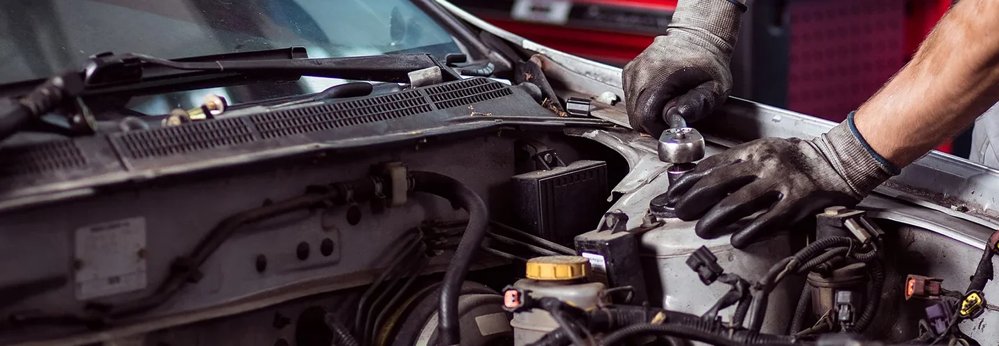 Service technician working on a Porsche