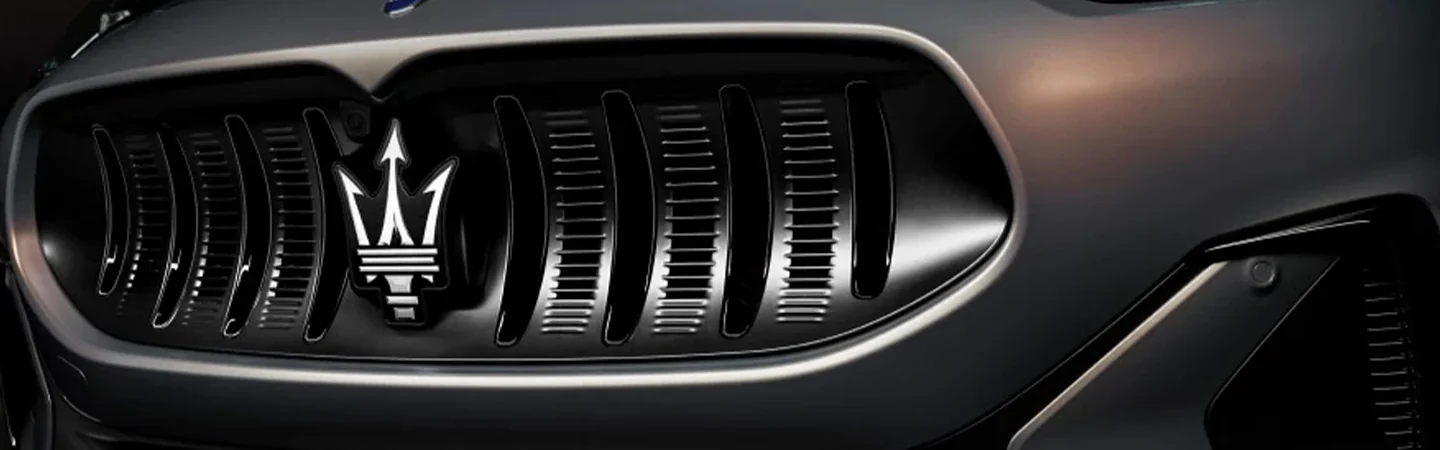 2025 Maserati Grecale Folgore Specs  brown color logo view
