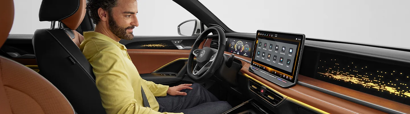 man sitting in tiguan