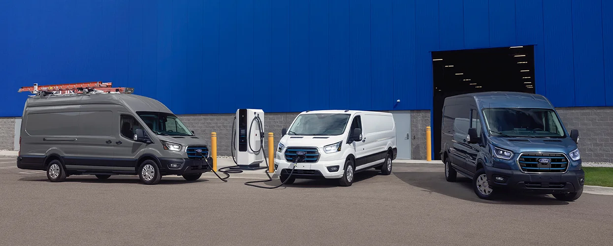 Commercial vehicles lined up infront of a wearhouse