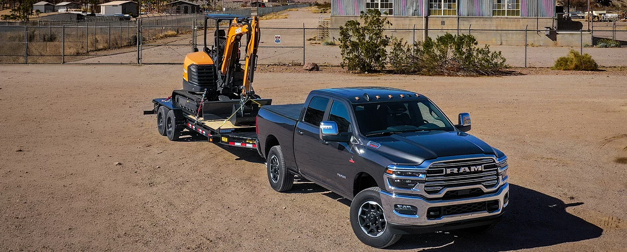 Ram truck towing a trailer on a North Florida road