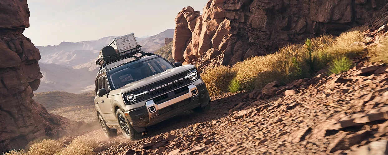 Ford Bronco driving through the mountains