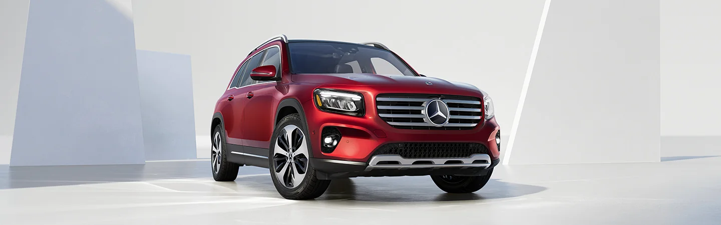 front view of a red 2025 Mercedes-Benz GLB 250
