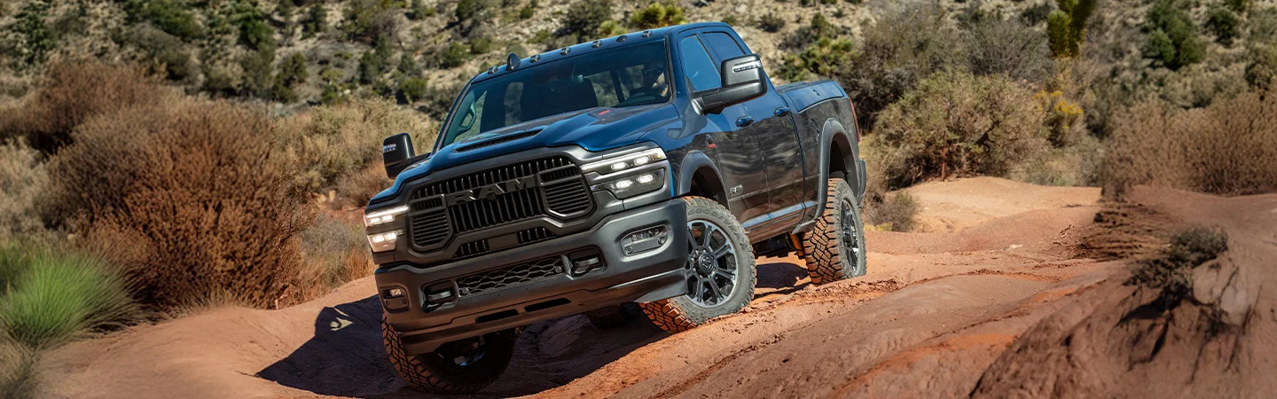blue 2025 RAM 2500 on trail
