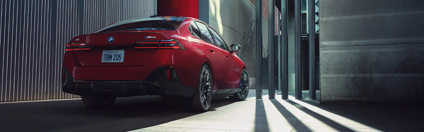 2024 BMW i5 Specs red sideview