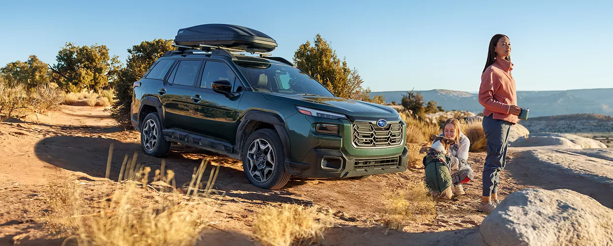 people camping with their Subaru Outback