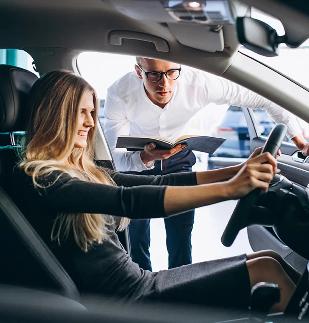 customer sitting inside new car