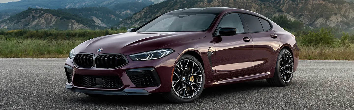 2024 BMW M8 Specs Side front in blue colour